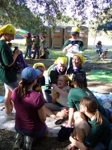 Girl Scouts doing first aid